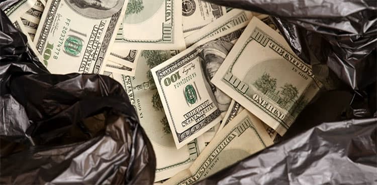 Lucky couple gets back large sum of money dropped in trash