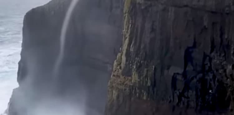 Water flows upwards climbing up 470m sea cliff