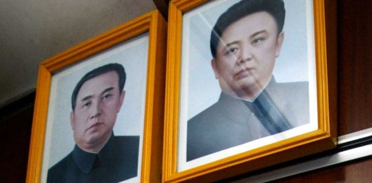 Mother faces jail for saving kids from fire instead of dictator's portrait