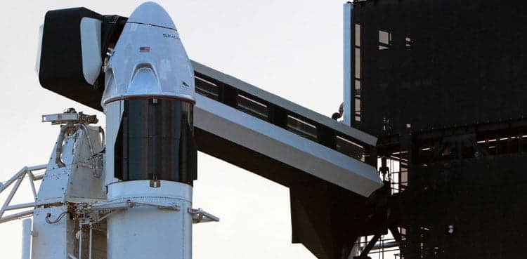 SpaceX delays launch of mini-satellites