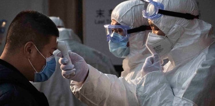 First U.S. person-to-person coronavirus spread reported as WHO panel meets