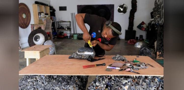 Nigerian artist turns plastic waste into fashion to raise awareness