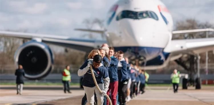 Sports stars, airline staffers pull heaviest plane for Guinness world record