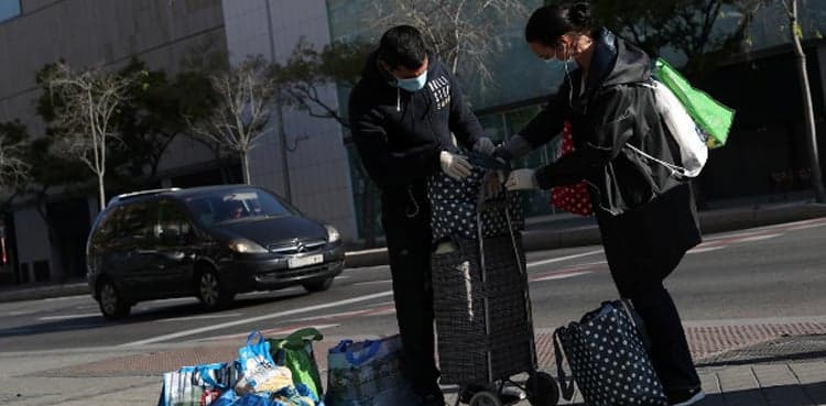 Spain toughens restrictions as coronavirus death toll surges