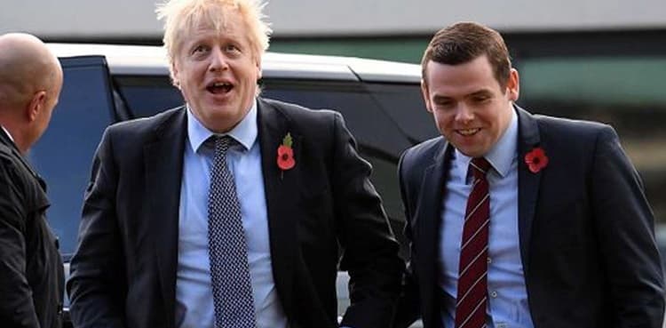 British junior minister quits over PM aide's lockdown drive