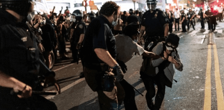 'I can't breathe' protests heat up as curfews imposed in several US cities