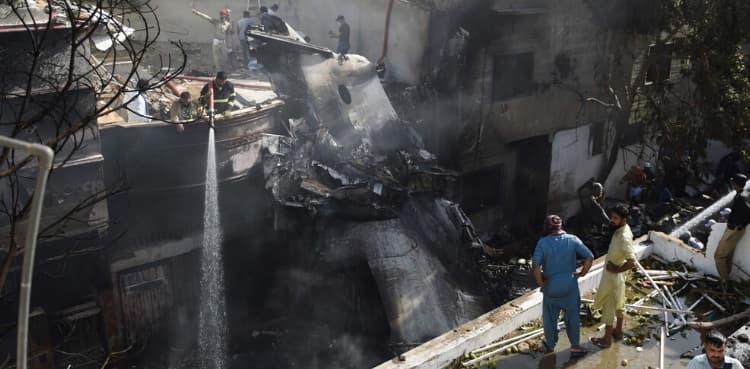 PIA investigation team inspects plane crash site