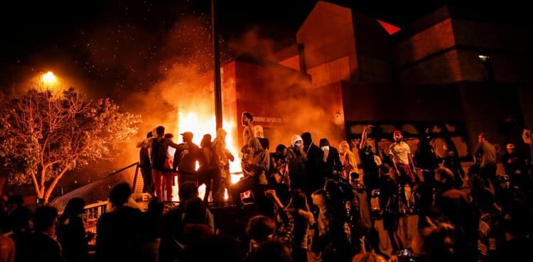 Racially charged violence rages for third night in US state
