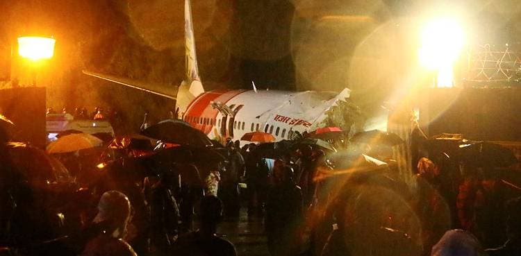 At least 15 dead as Air India Express plane crash-lands in Kerala