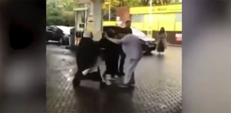 WATCH: Women hurl punches at petrol station over face mask row