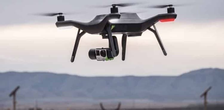 Man arrested by detectives after drone hits police helicopter