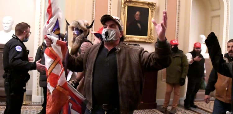 Arrested Capitol rioters had guns and bombs