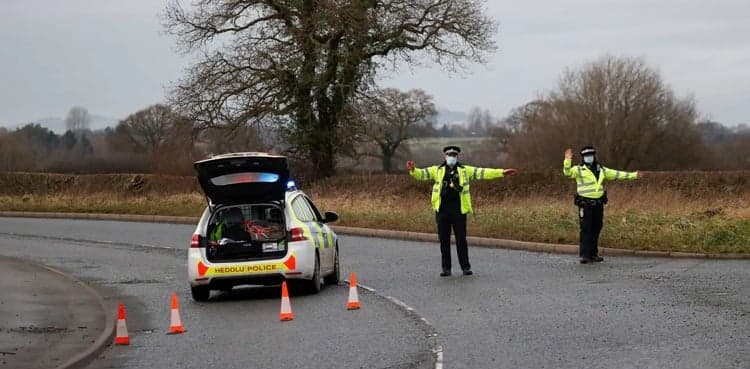 Man charged over suspect package sent to UK COVID-19 vaccine plant