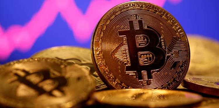 Bitcoin nears $50,000, wider adoption fuels record rally