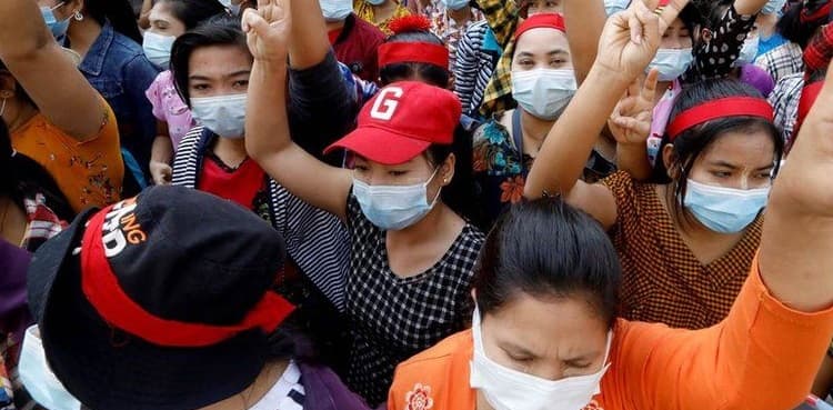 Myanmar police warn protesters to disperse, general repeats pledge of new election