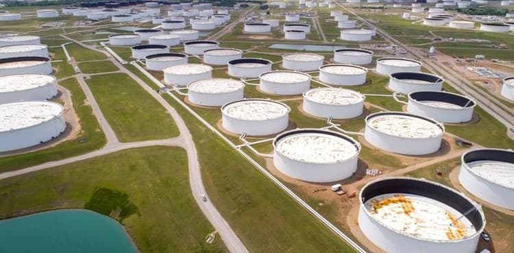 Oil slips after US crude stocks rise amid deep freeze hit to refiners