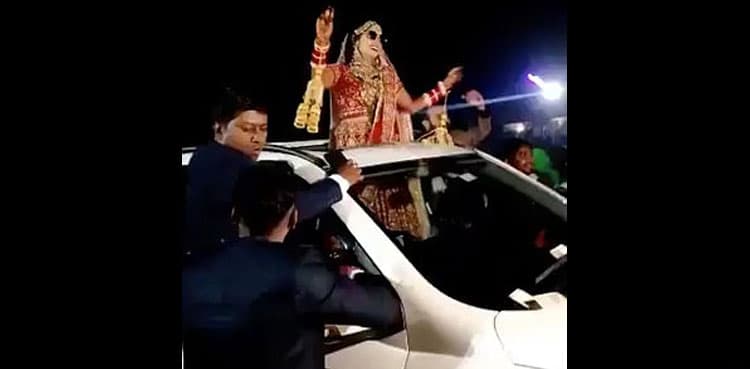 Bride narrowly escapes death as car smashes into wedding procession