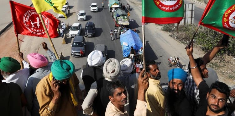 Indian farmers block highway outside Delhi to mark 100th day of protest