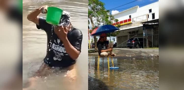 Video of man 'bathing' and 'fishing' in pothole goes viral