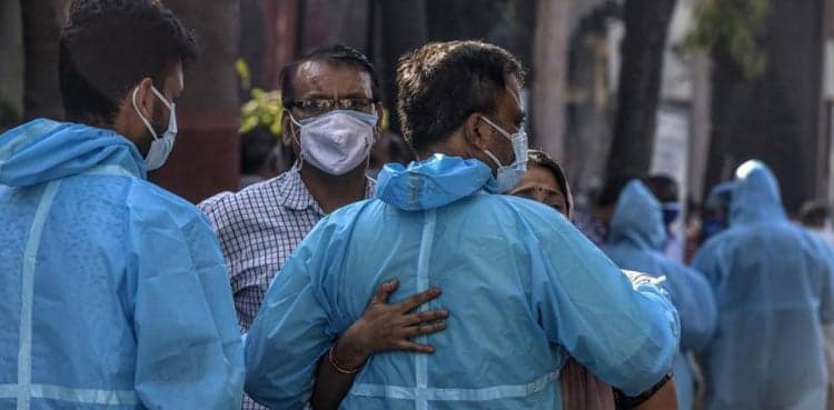 India's coronavirus crisis intensifies as nations pledge aid
