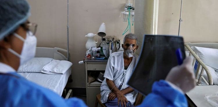 India's COVID-19 case total nears 20 million