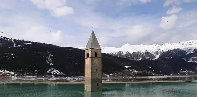 Remains of 'lost' village emerge from Italian lake after 71 years