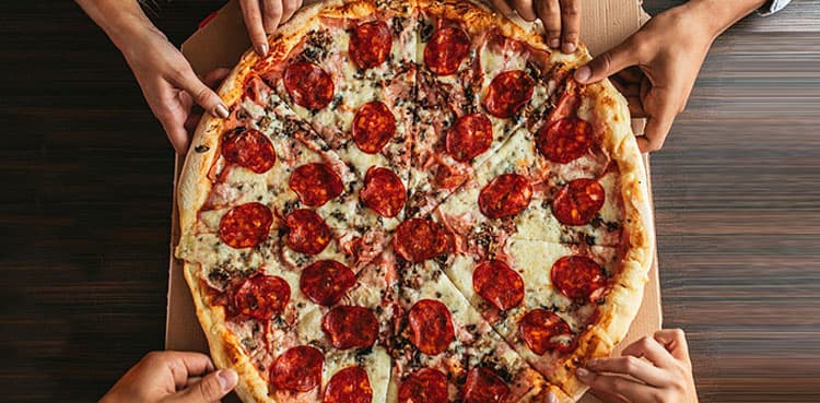 Woman gets huge compensation after being left out of office pizza party