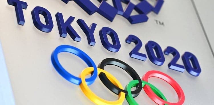 Organisers show off Olympic village a month before Games begin
