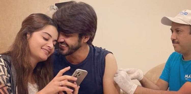 Ahsan Mohsin Ikram gets vaccinated with Minal Khan for support