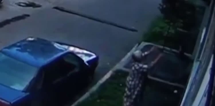 Caught on CCTV: Woman, 64, catches toddler after he falls from window