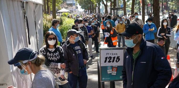 Australia aims to 'live with coronavirus'