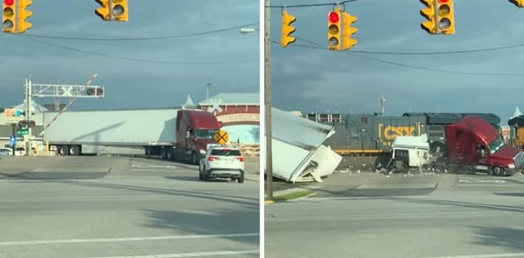 WATCH: Freight train slams into semi-truck, driver unhurt