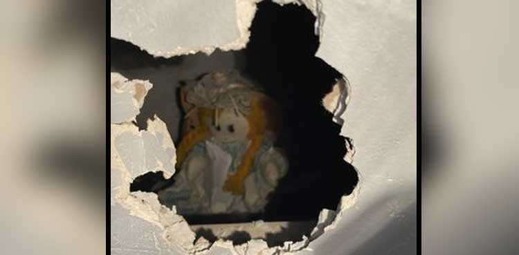 Man finds hidden doll with murder note in new home