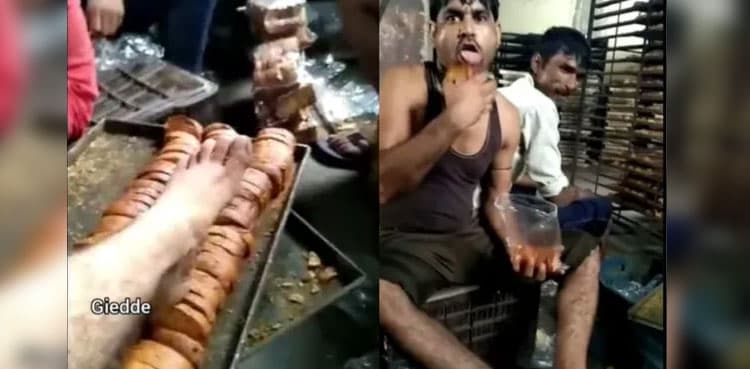 Shocking video shows workers putting dirty feet on rusks, licking them