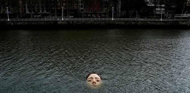 Who is this girl drowning in the river?