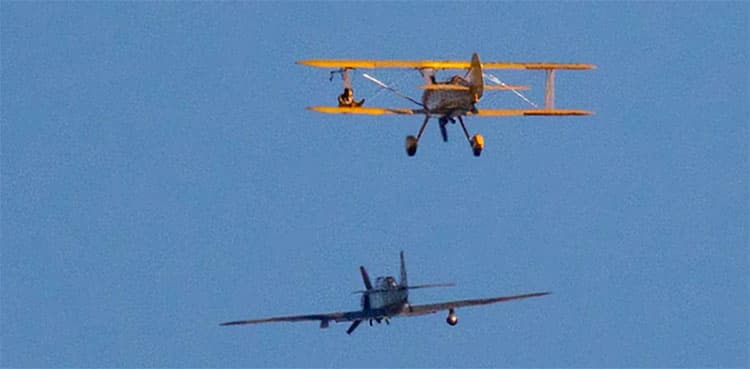 Tom Cruise climbs airplane's wing mid-air to perform daredevil stunt