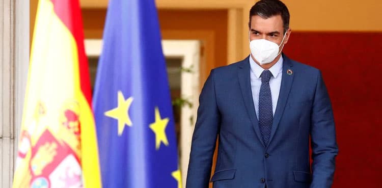 Spanish PM says Omicron surge won't ruin Christmas as curbs discussed
