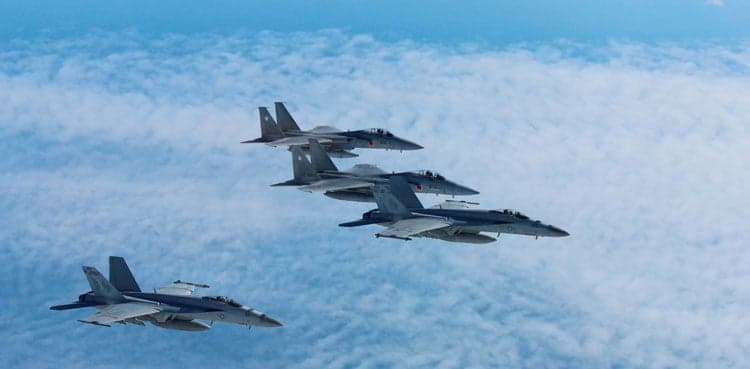Japanese F-15 missing, crew member reportedly spotted in sea