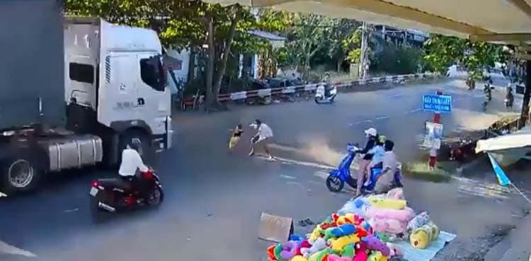 Viral video: Man saves child from approaching truck