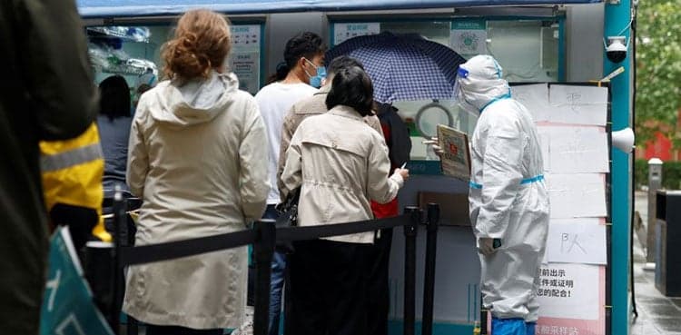 China posts 6-month high COVID count as it sticks with strategy
