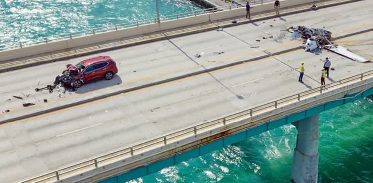 Horrific: Plane crash lands on bridge, hits vehicle head-on
