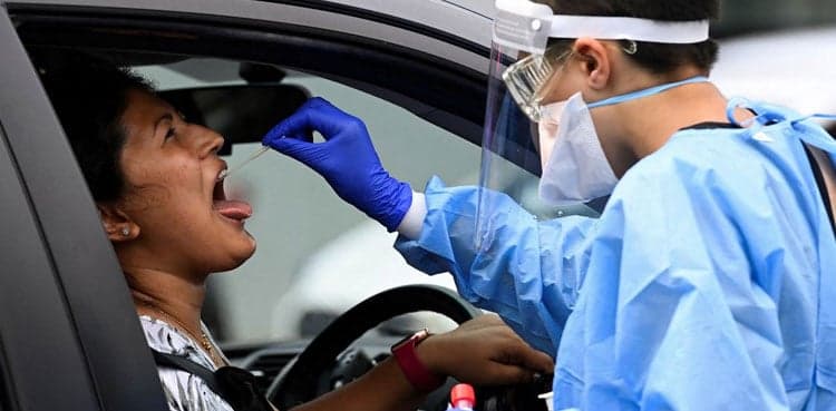Australia reinstates COVID quarantine pay amid fresh Omicron wave