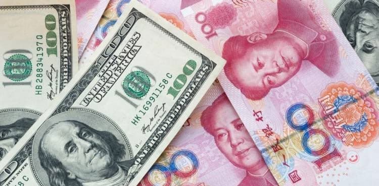 US Dollar slips off six-month high, Yuan boosted