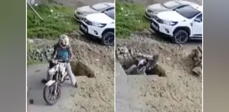 Viral: Motorcyclist falls into giant pothole with his two-wheeler
