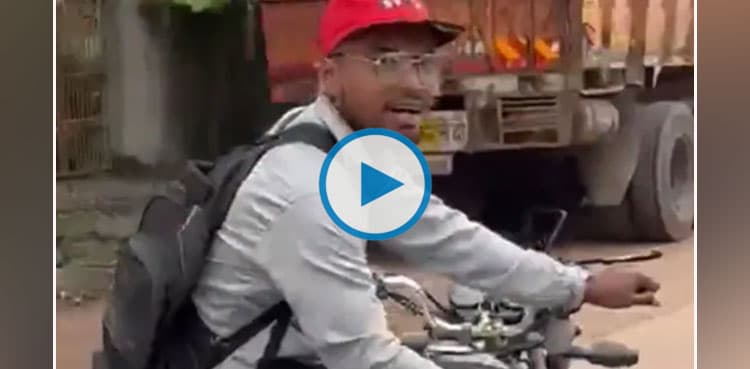 Viral video: Man performs stunt on moving bike, lands in trouble