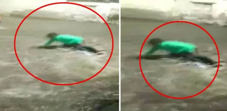 Viral: Locals rescue man and his bike swept away in rain