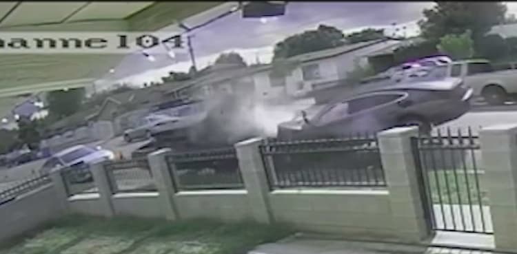 Car crashes head-on into truck, horrific video goes viral