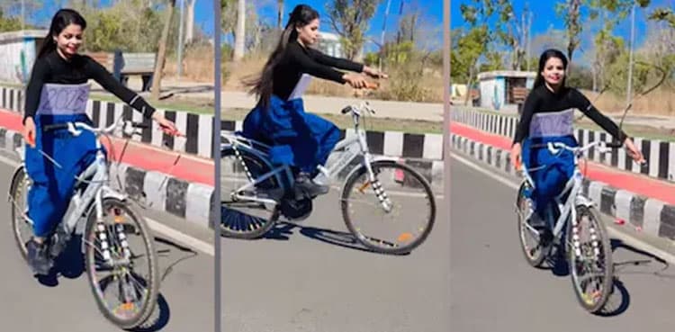 Must see: Woman performs dangerous stunt on bicycle