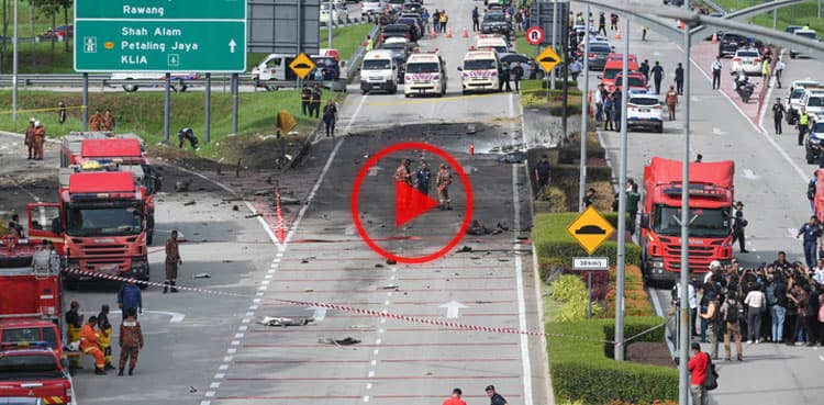 Watch: Ten killed in light plane crash on street in Malaysia