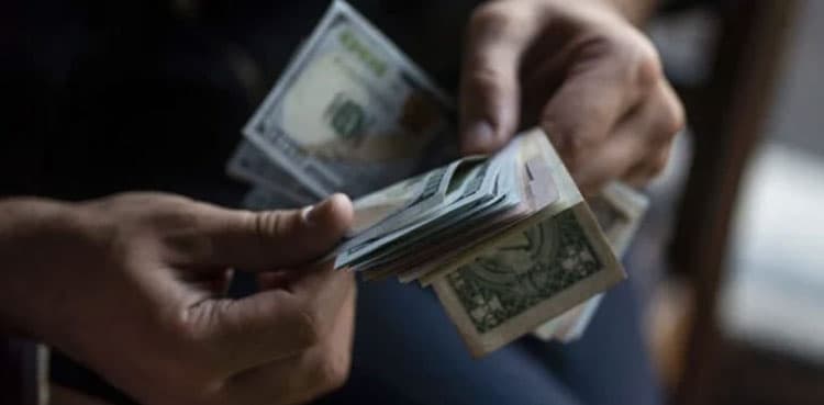 Rupee slides against US dollar in interbank